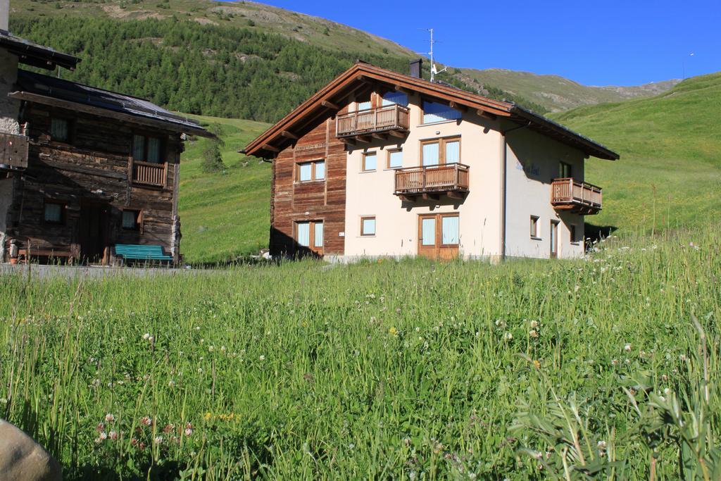 Bait Del Pont Aparthotel Livigno Bagian luar foto